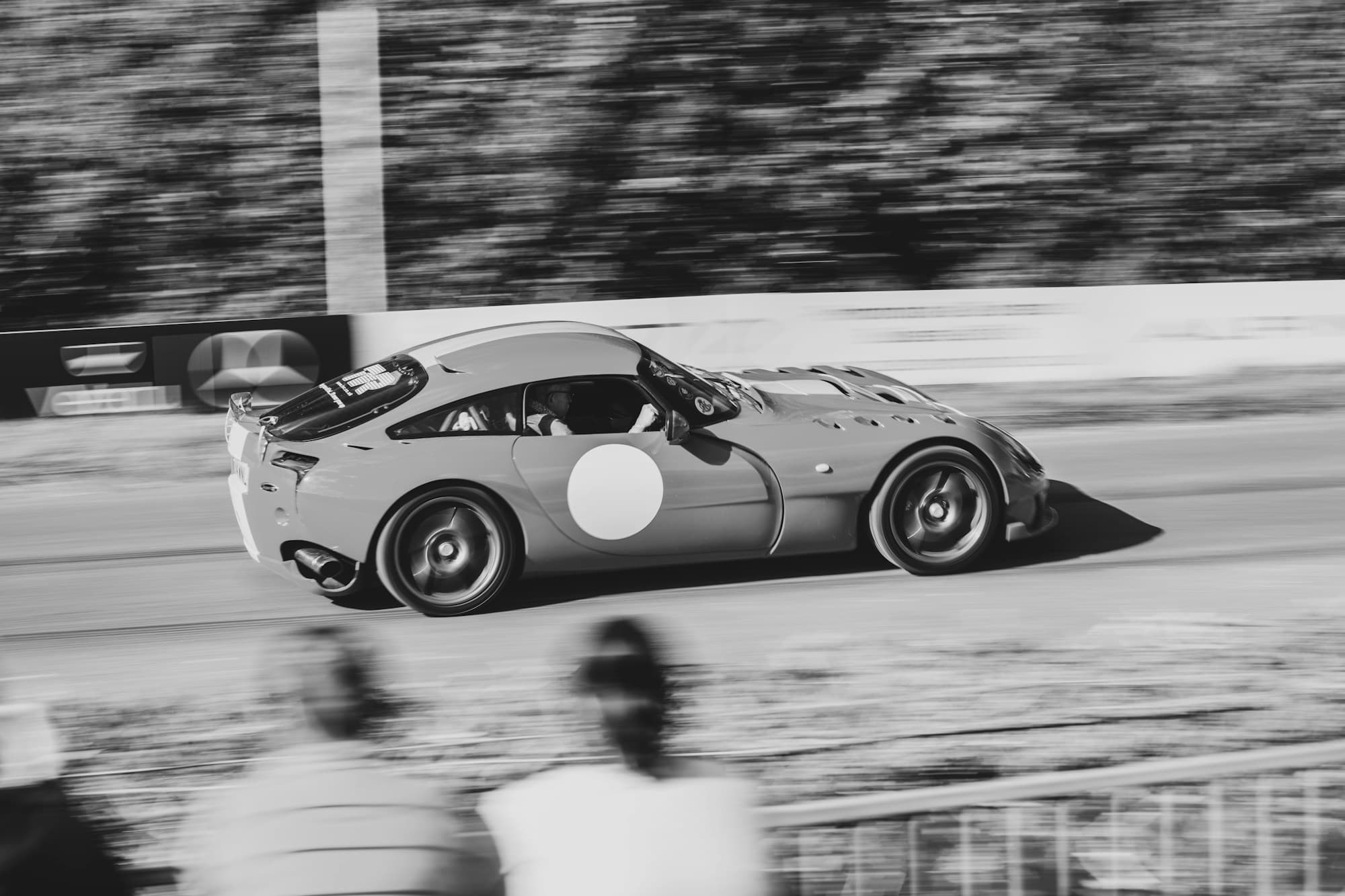 Race car panning shot in black and white